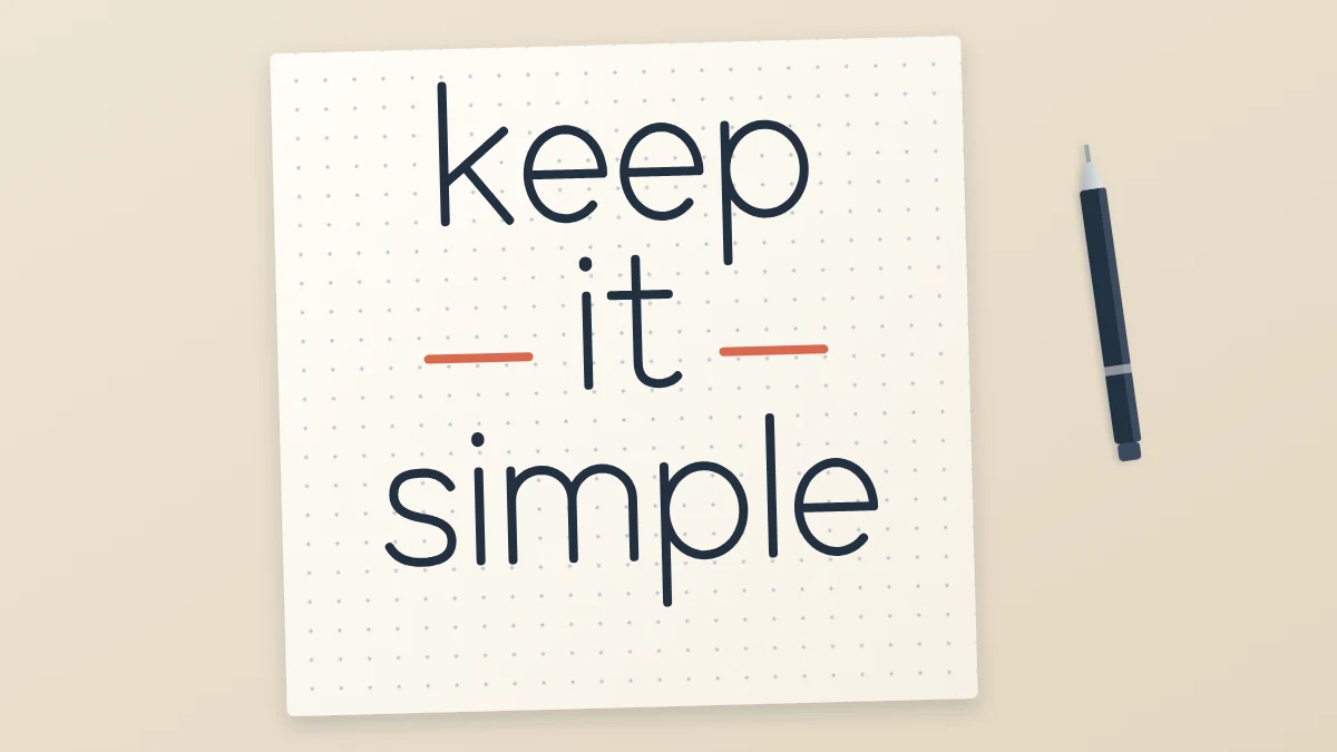 The words keep it simple stacked on three lines in even-line lettering on dot grid paper beside a fineliner pen